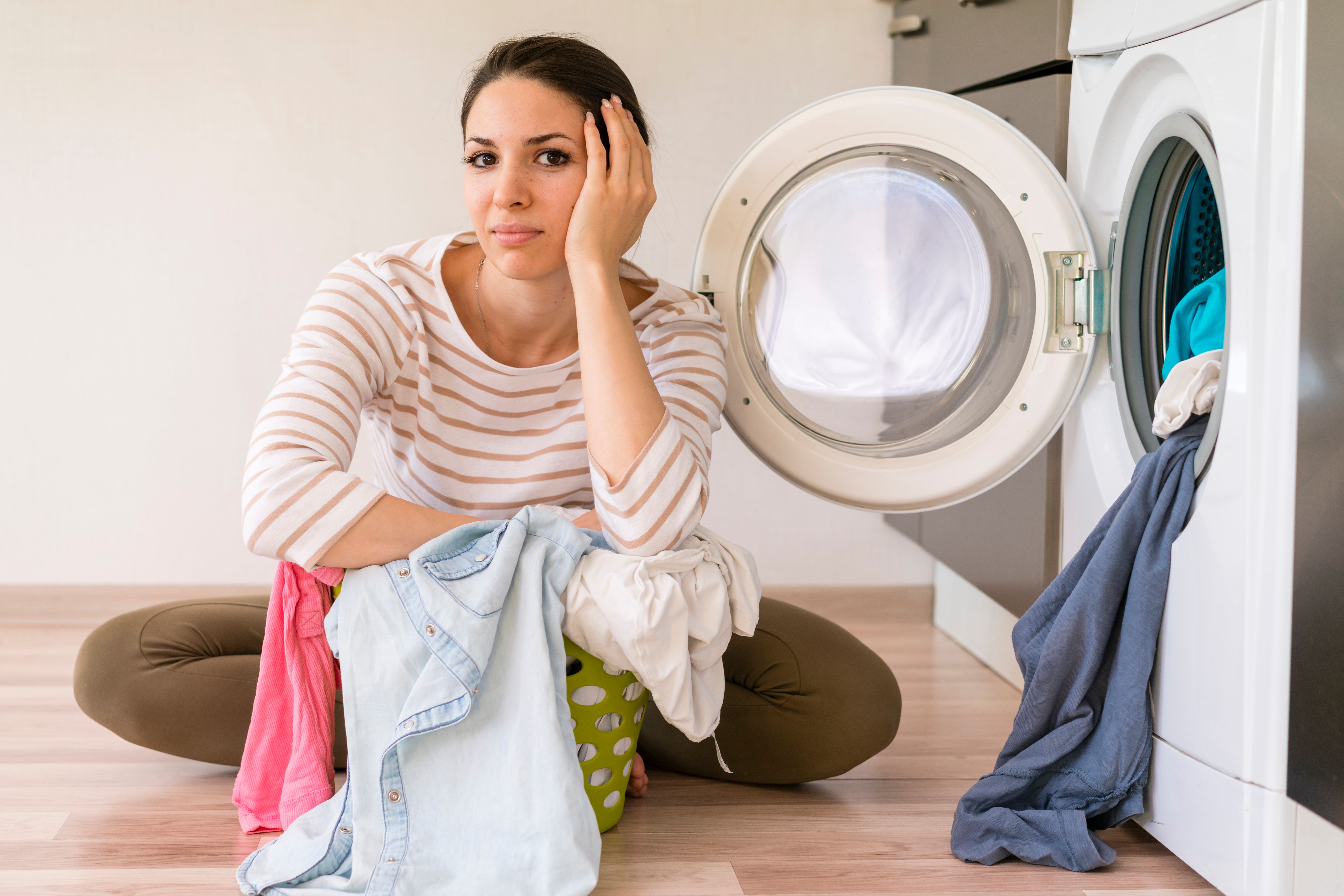 tired-beautiful-woman-laundry-room.jpg